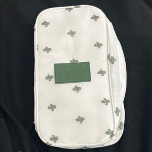 White Travel Pouch with Green Accents